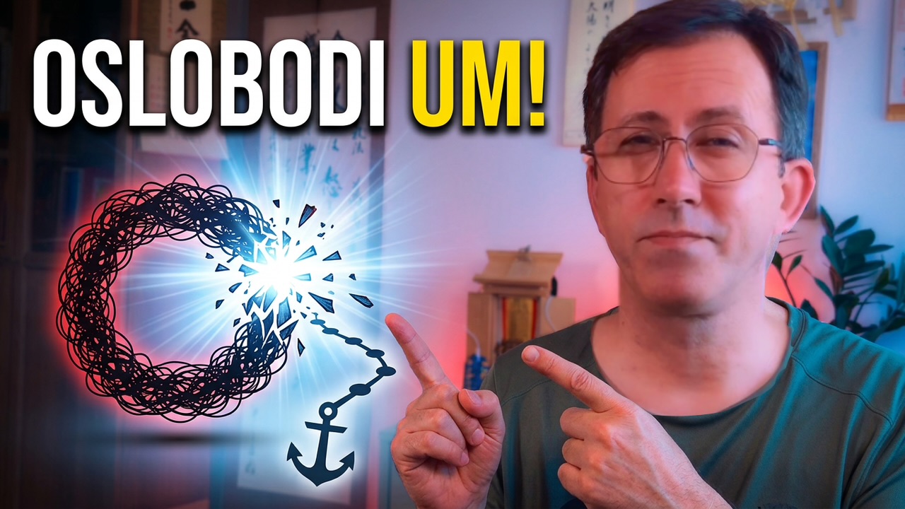 Danijel Salijević pokazuje na grafiku simbola kruga koji puca i oslobađa sidro, uz tekst Oslobodi um.